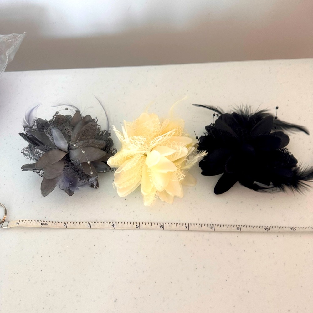 Set of 3 hair accessories. Easily clipped in hair or attached to band